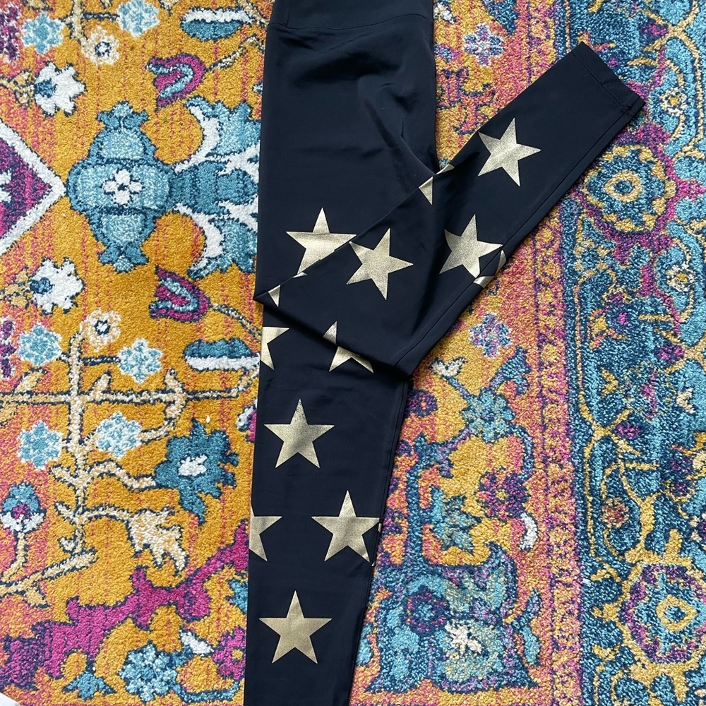 Coverleg black leggings with gold stars, size small